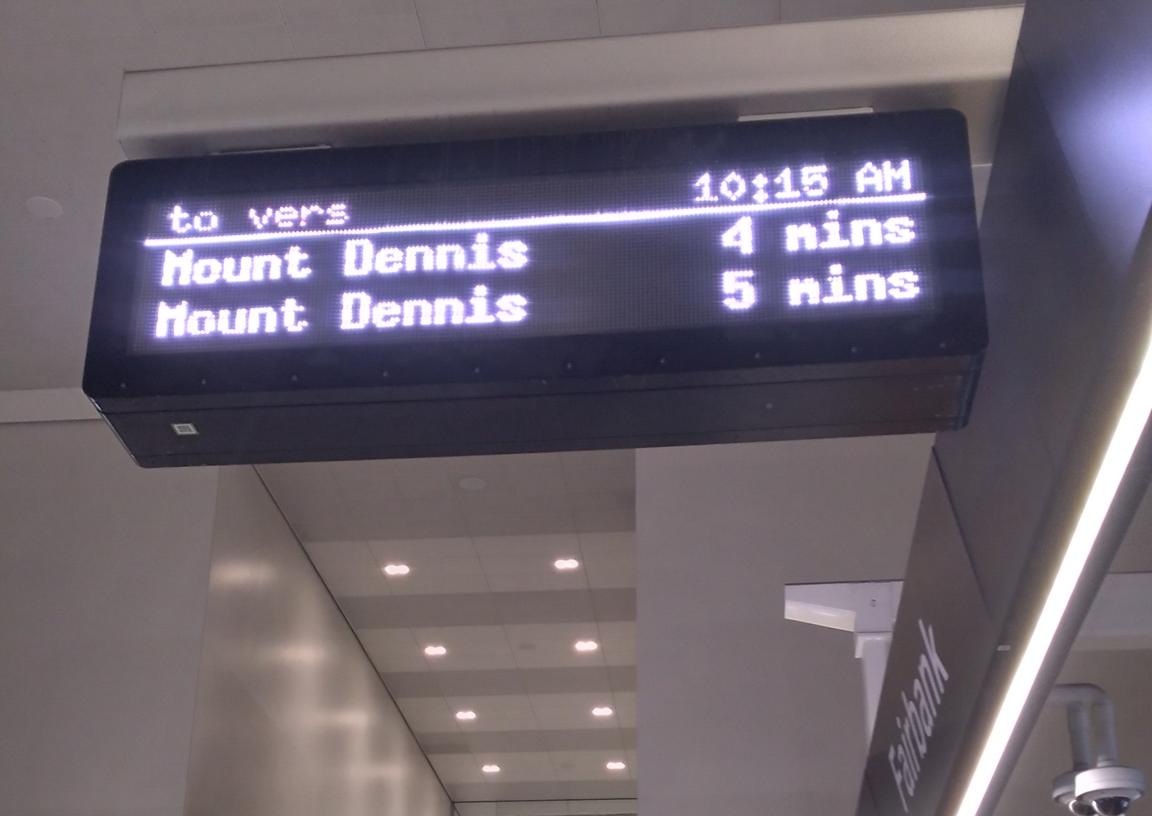 Next two trains to Mount Dennis in 4 and 5 minutes, 10:15 a.m. at Fairbank