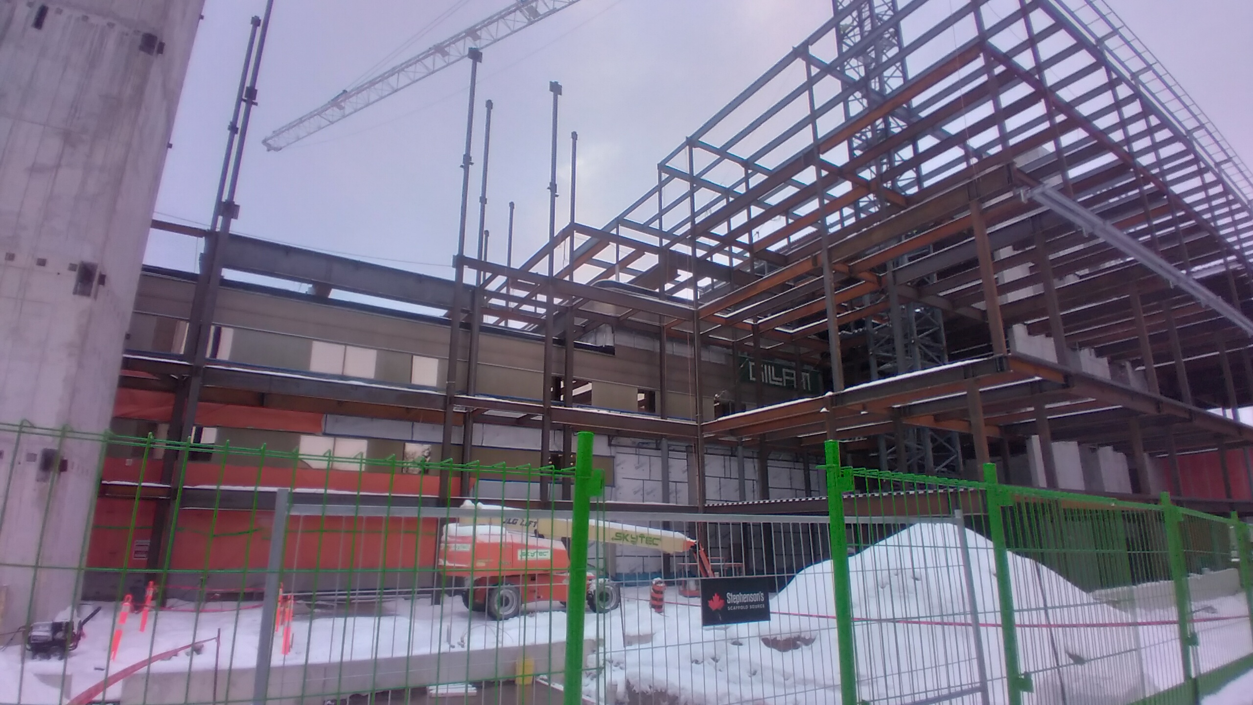 Northeast side showing mostly completed frame, December 2025.