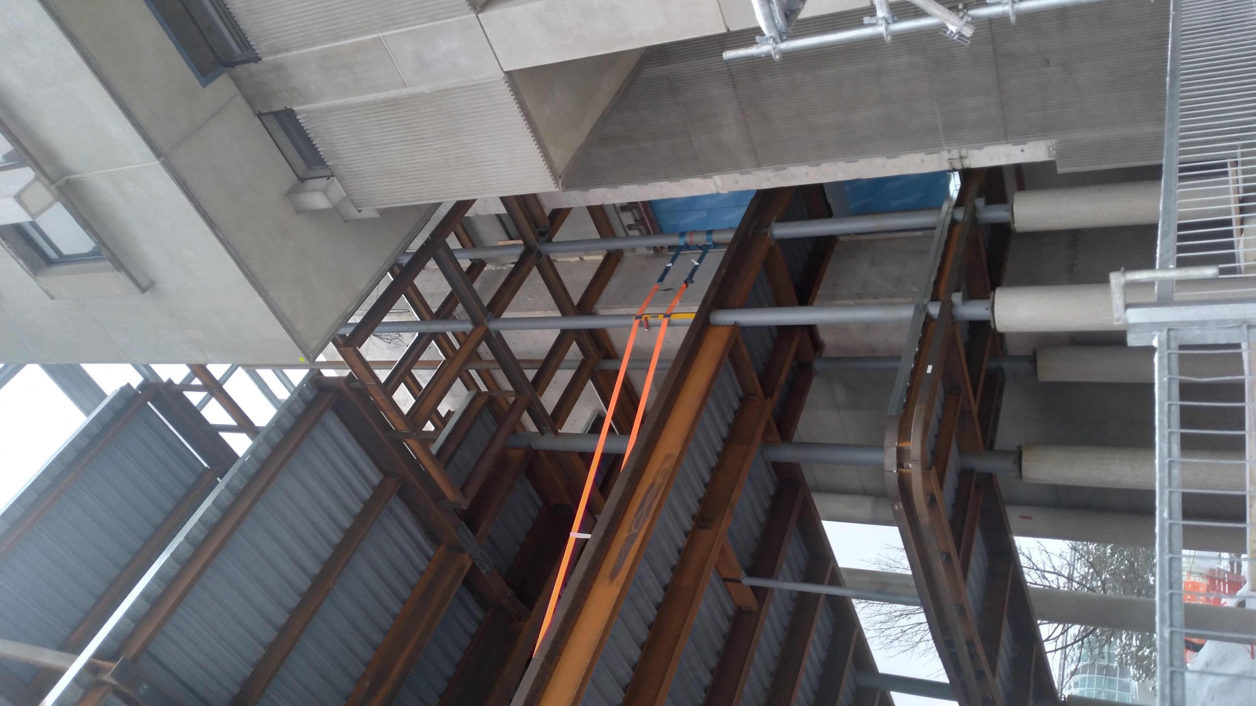 Frame near MC building complete with steel ruffle plates partly done, December 2025