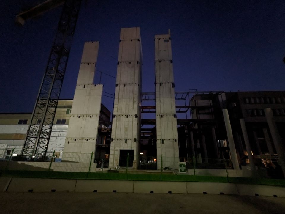 View of the concrete elevator shafts and/or stairwells, October 2025.